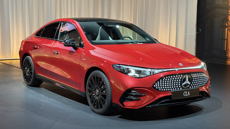 Front 3/4 view of a red Mercedes-Benz CLA EV