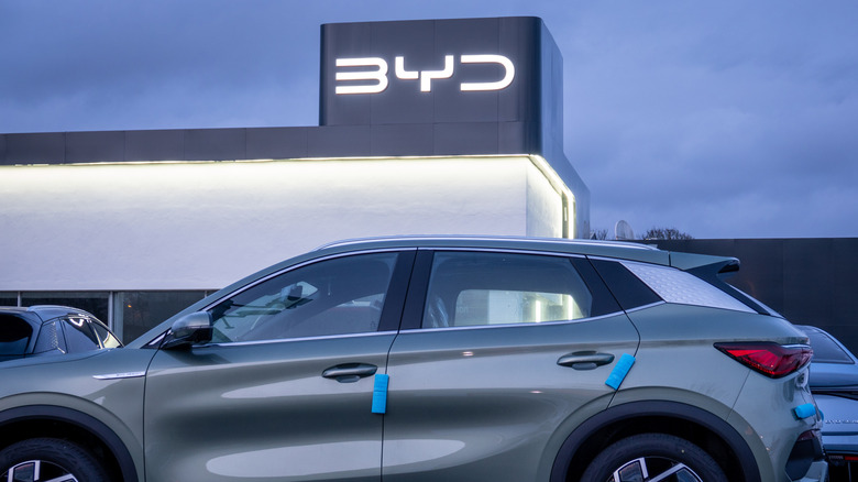 Brand new unregistered BYD electric cars are displayed for sale outside a BYD dealership, on February 20, 2025 in Bristol, England.