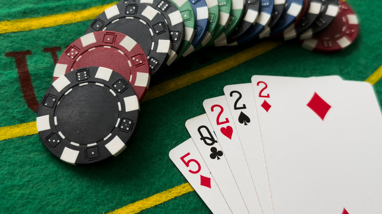 Poker cards with combination. The winning combination in a game in a poker club