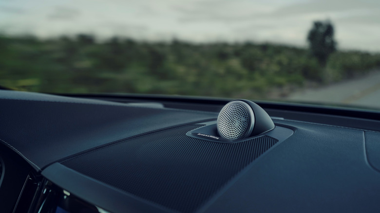 A photo of a speaker on the dash of a Volvo car.