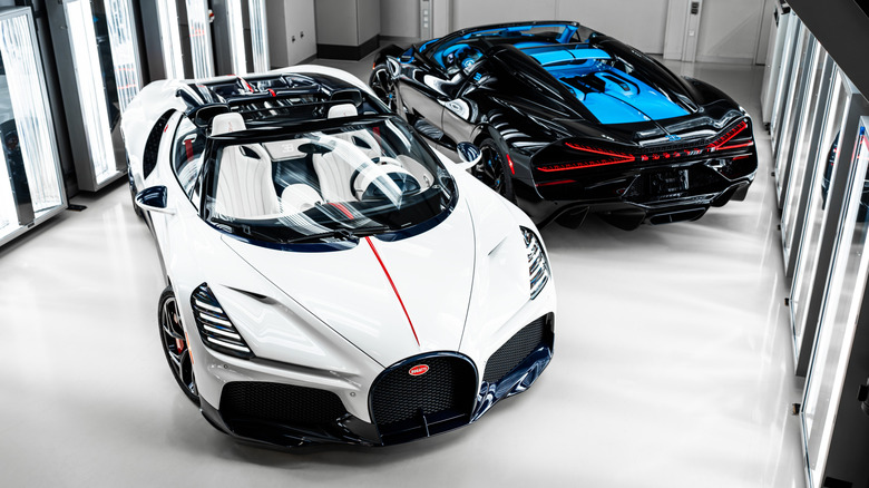 Two Bugatti W16 Mistrals parked in a studio