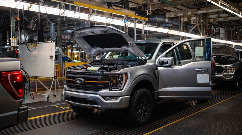 A photo of Ford trucks on the production line.