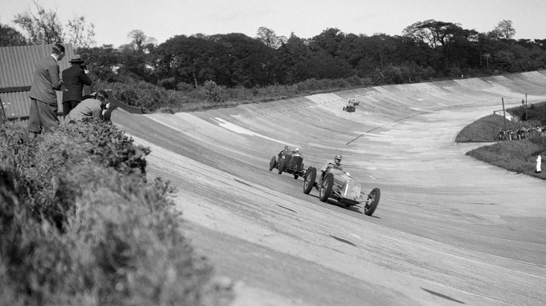 Cars rounding the banking at Brooklands in the early 1930s