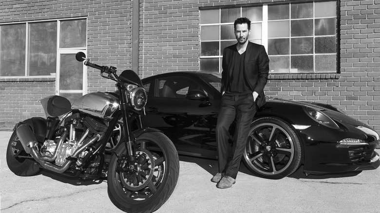 Keanu Reeves with his 997 Porsche 911 and motorcycle