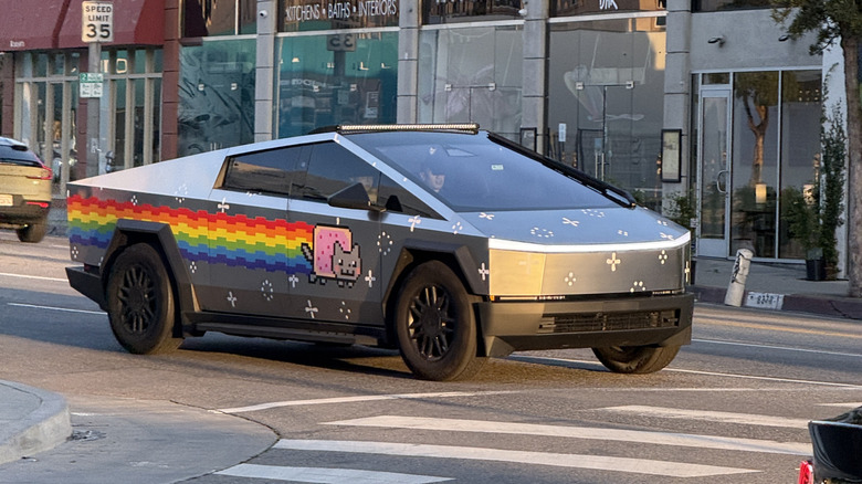 A Tesla Cybertruck with a Nyan Cat wrap