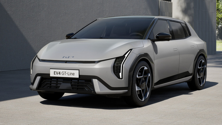 Front 3/4 view of a grey Kia EV4 hatchback