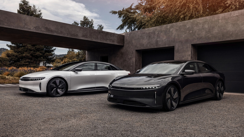 A photo of two Lucid Air sedans.