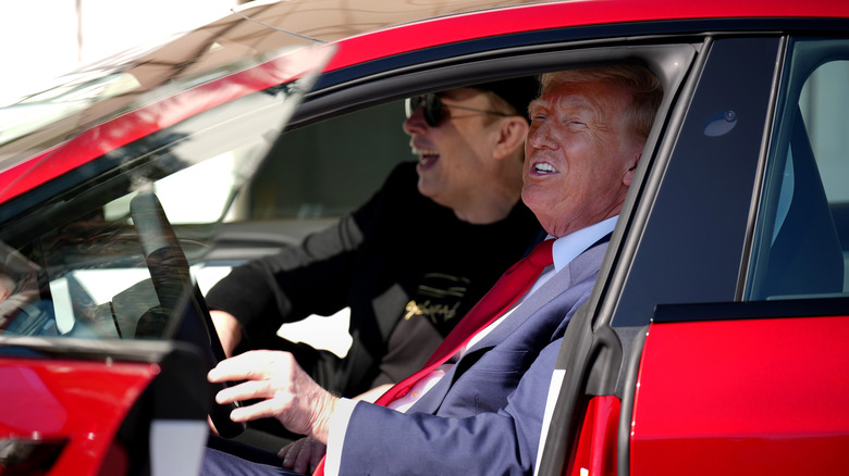 President Donald Trump and White House Senior Advisor, Tesla and SpaceX CEO Elon Musk sit in a Tesla Model S on the South Lawn of the White House on March 11, 2025 in Washington, DC.