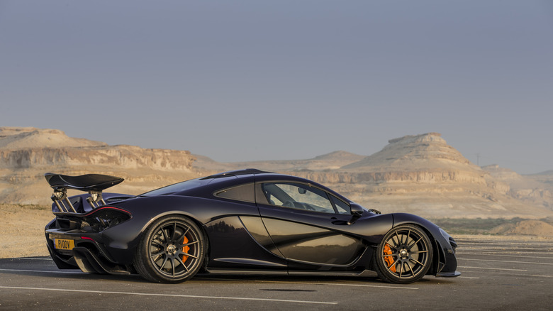 A McLaren supercar parked against a desert backdrop