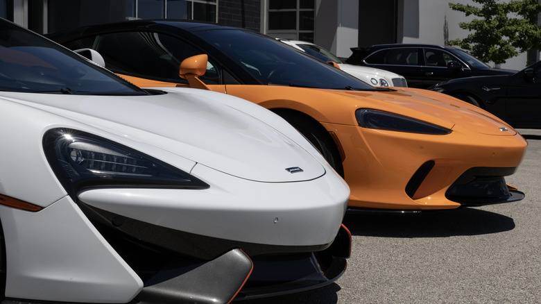 McLaren 570S and McLaren GT display at a dealership