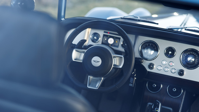 A photo of the interior of a Morgan Supersport car in blue.