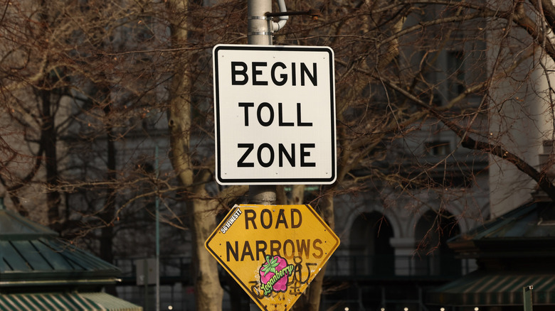 Toll signs are seen on Park Row on February 20, 2025 in New York City.