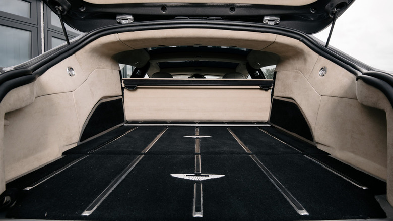 A photo of the interior of an Aston Martin wagon.