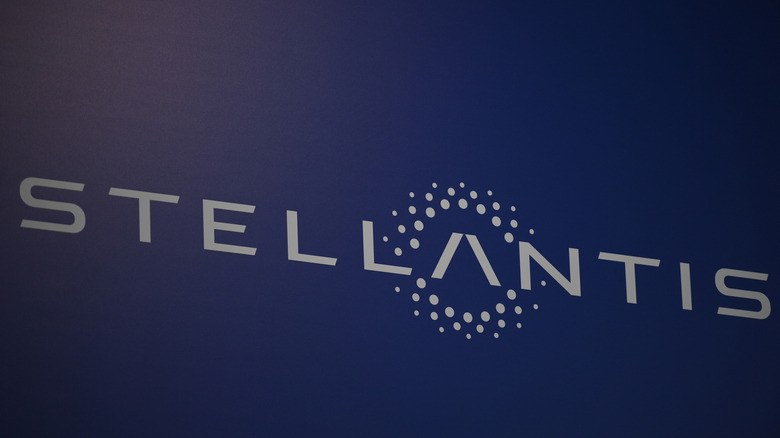 A photo of the Stellantis logo on the side of a building.