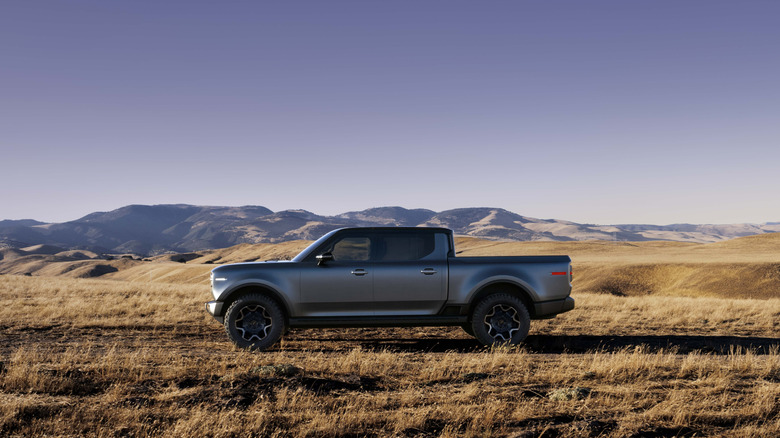 A photo of the side of a Scout pickup truck.