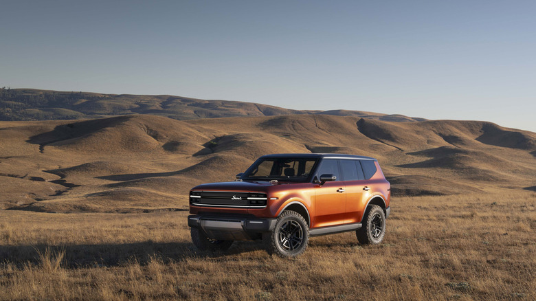 A photo of a Scout electric SUV in a hill.