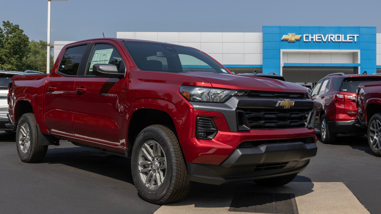 A photo of a Chevrolet truck at a dealer.