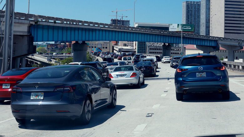 Vehicles travel along I-95 on May 24, 2024 in Miami, Florida.