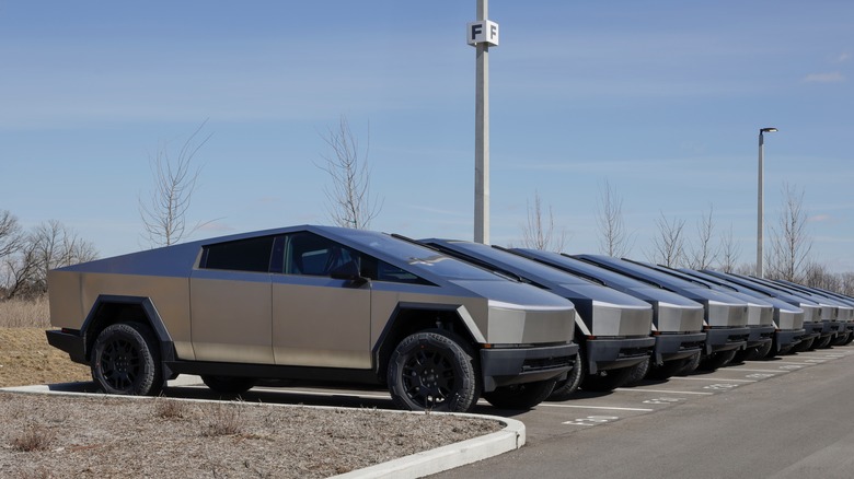 Tesla Cybertrucks on display at a dealership.