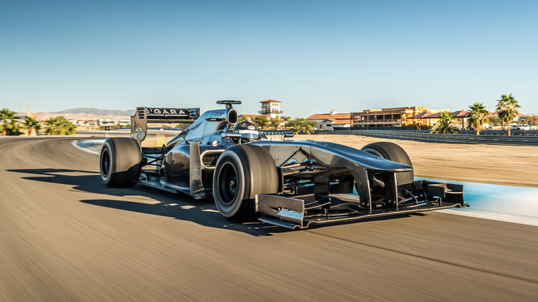 A photo of the front quarter of a TDF Formula 1 car.