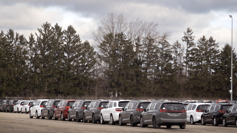 Vehicles manufactured by Stellantis sit in a lot before being loaded into train cars on February 04, 2025 in Windsor, Canada.