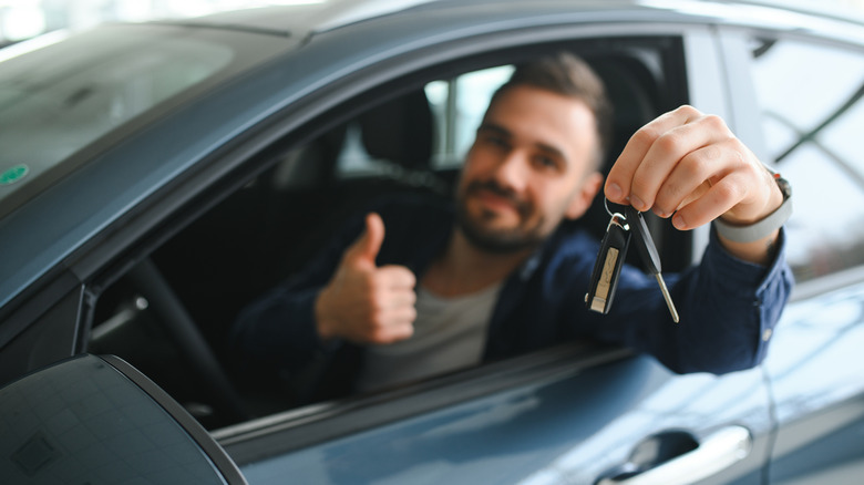 man buying a car