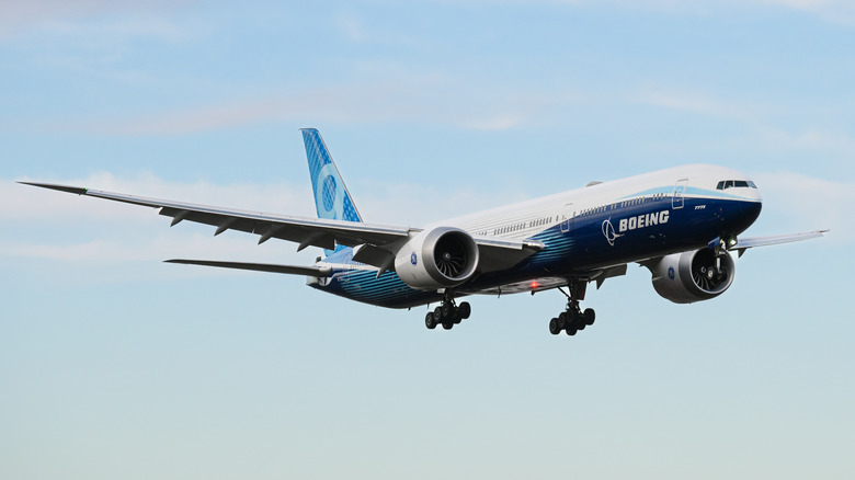 Boeing 777-9 prototype of 777X aircraft wheels down on final approach