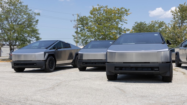 Tesla Cybertruck display at a dealership. Tesla offers the Cybertruck with driving range of up to 340 miles.