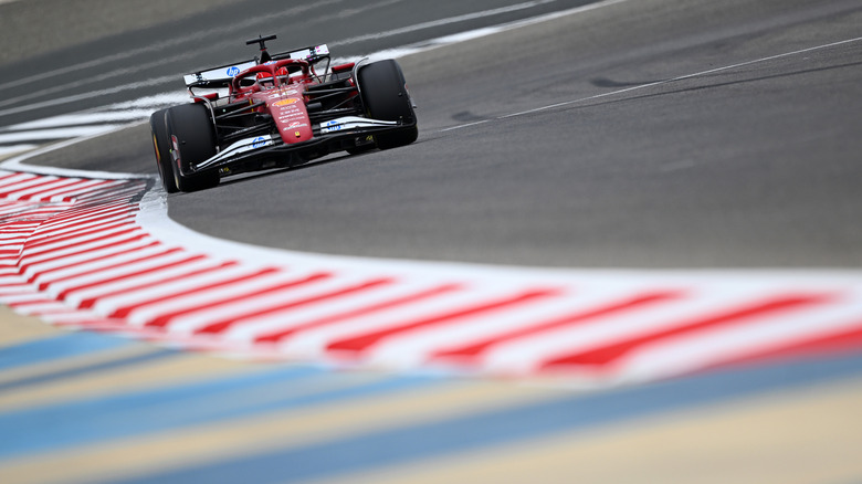 A photo of a Ferrari F1 car on track.