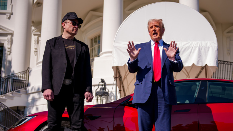 U.S. President Donald Trump, accompanied by White House Senior Advisor, Tesla and SpaceX CEO Elon Musk, speaks next to a Tesla Model S on the South Lawn of the White House on March 11, 2025 in Washington, DC.