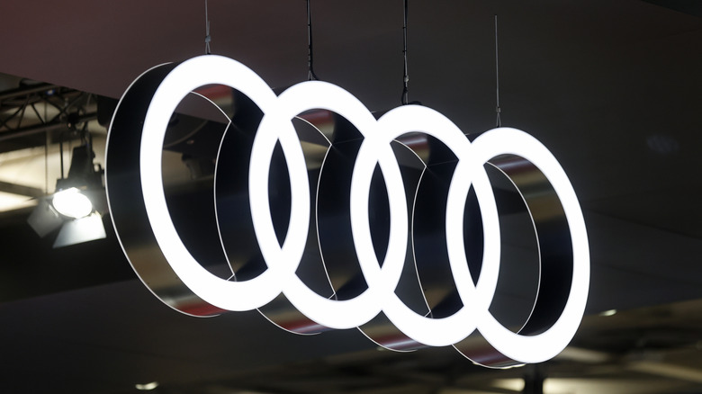 A photo of the Audi logo on a building.