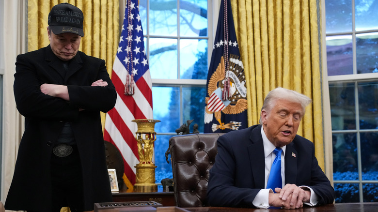 A photo of Donald Trump and Elon Musk in the Oval office.