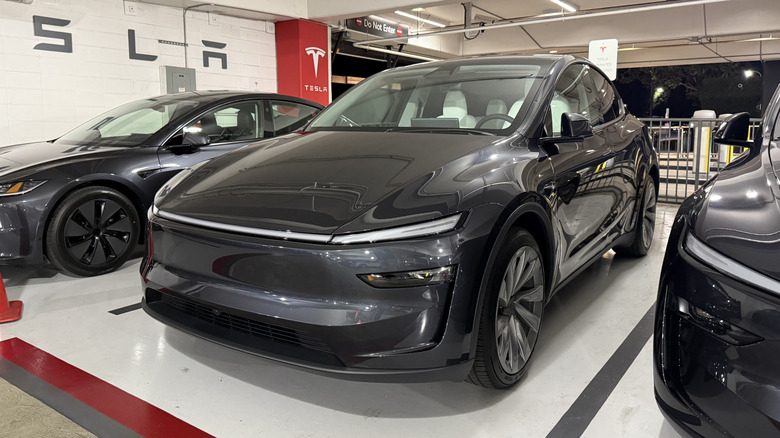 Front 3/4 view of a grey Tesla Model Y