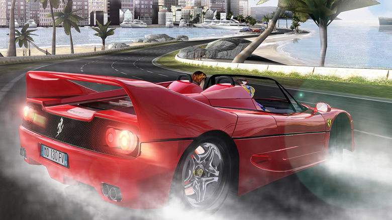 a screen shot of a red convertible on a seaside road from a video game