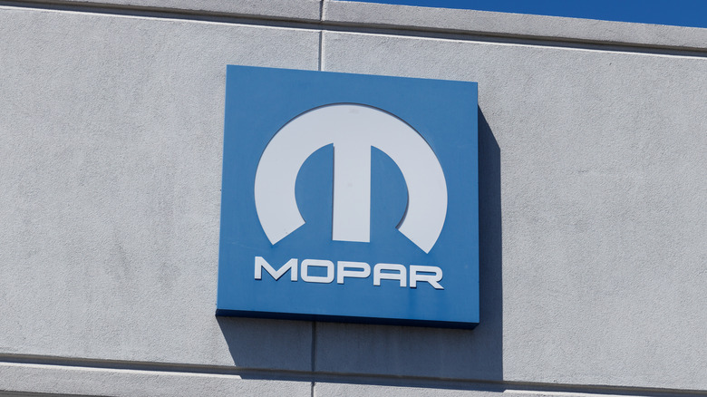 A photo of the Mopar logo on the side of a building.