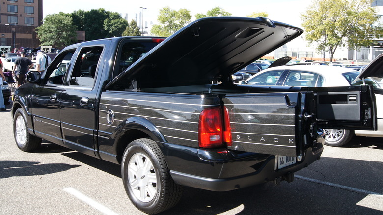 A lincoln blackwood from the rear with its bed completely open