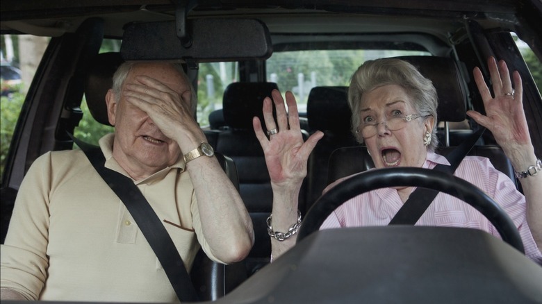 Two old folks scared behind the wheel