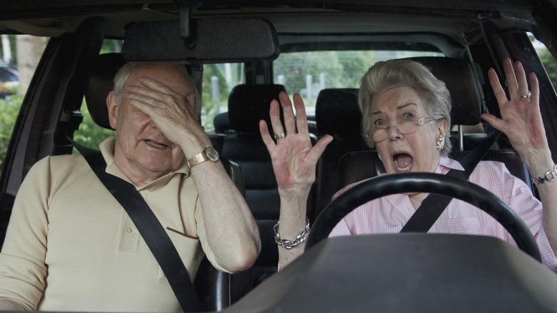 two old folks scared behind the wheel