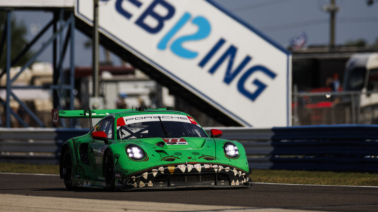 A green, monster-mouthed Porsche at Sebring