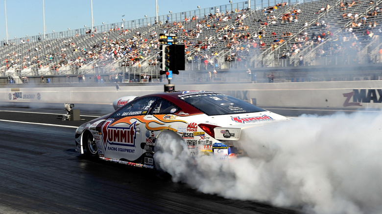 Greg Anderson, driver of the Summit Pro Stock drives during the O'Reilly Auto Parts NHRA Nationals at zMax Dragway on September 19, 2010 in Concord, North Carolina.