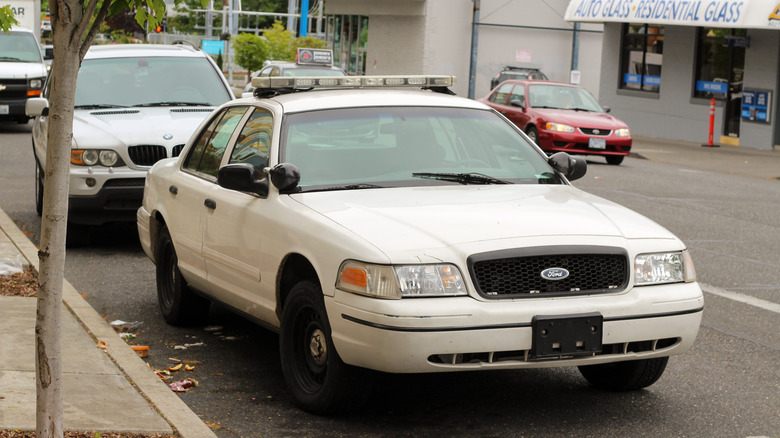 Retired Crown Victoria Police Interceptor with an added Whelen Liberty lightbar by owner.