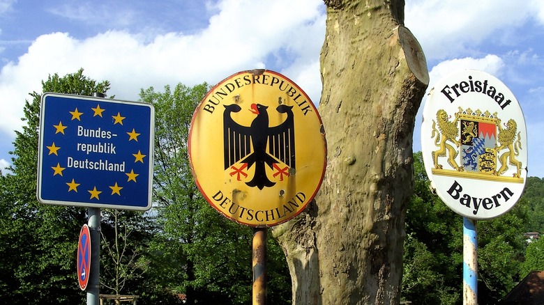 A set of border road signs in Germany