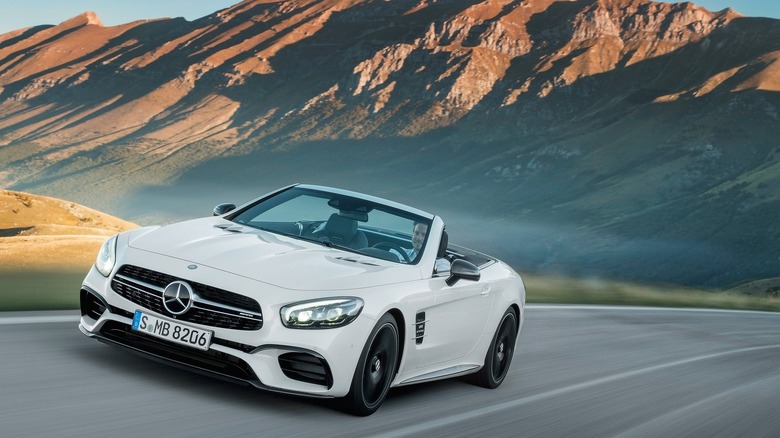 A photo of a silver Mercedes-Benz sports car.