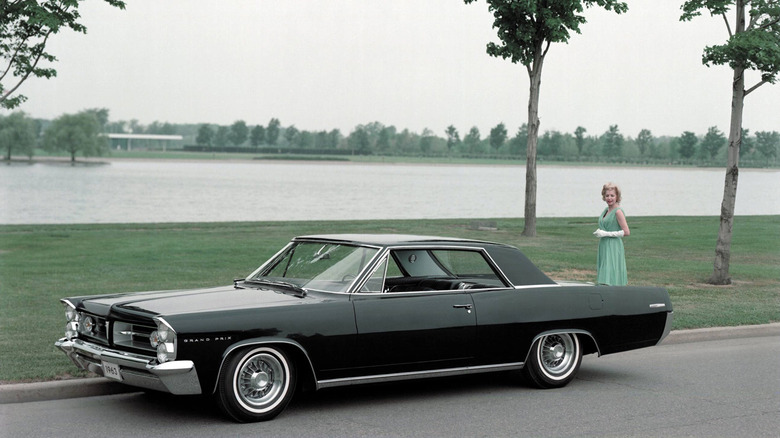 A photo of a black Pontiac Grand Prix sedan.