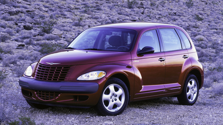 A photo of a purple Chrysler PT Cruiser.