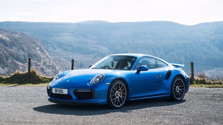 A photo of a blue Porsche  911 sports car.