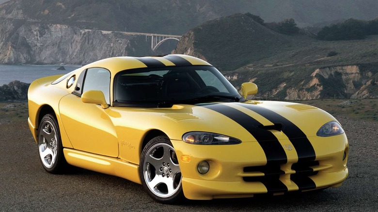 A photo of a yellow Dodge Viper sports car.