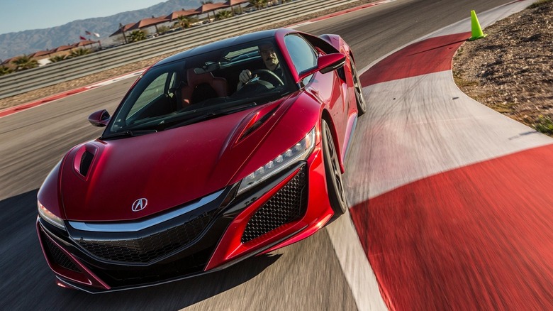 A photo of a red Acura NSX sports car.