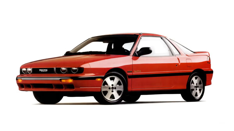 An Asüna Sunfire - AKA Isuzu Impulse - in red on a white background