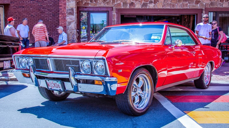 A Beaumont in red at a car show